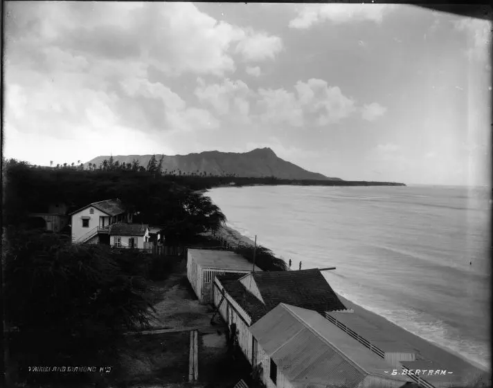Historic photograph of Waikiki Beach with Diamond Head in the background.